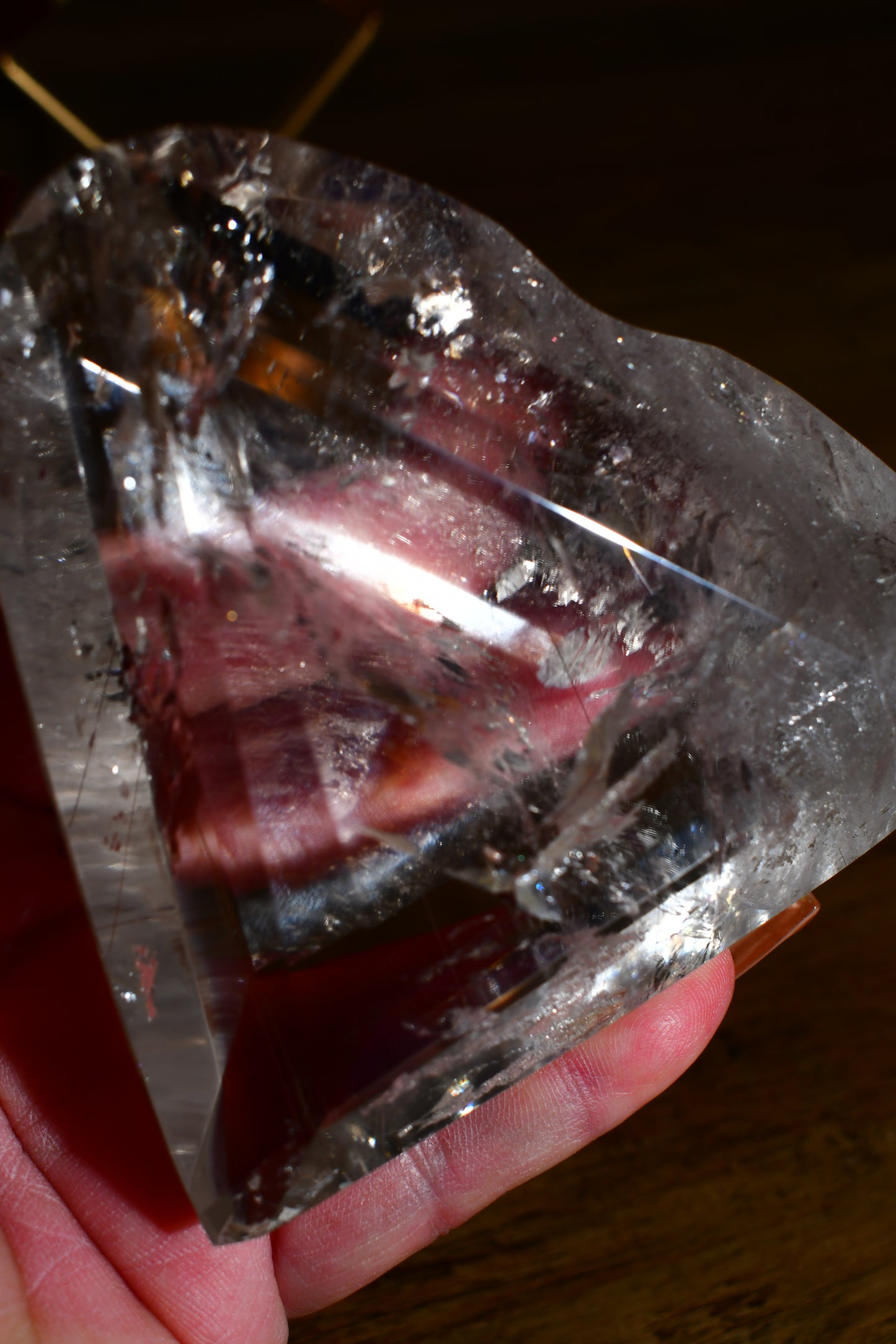 Lemurian Heart Carving with Rutile on Spinning Stand